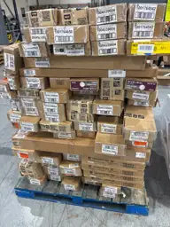 Pallet of assorted faux wood… — Photo 1