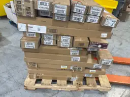 Pallet of assorted faux wood… — Photo 2