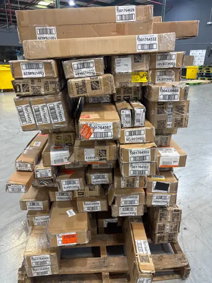 Pallet of assorted faux wood… — Photo 3