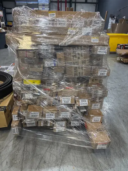 Pallet of assorted faux wood… — Photo 1