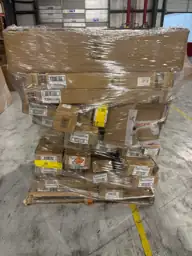 Pallet of assorted faux wood… — Photo 1