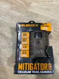 Muddy cell trail camera — Photo 1