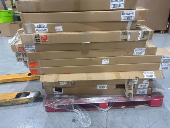 Pallets of assorted faux wood… — Photo 2