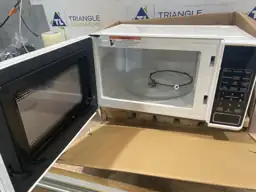 Mainstays 0.7 Cubic Foot Microwave… — Photo 4