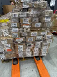 Pallets of assorted faux wood… — Photo 1