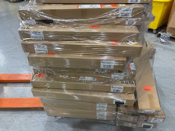 Pallets of assorted faux wood… — Photo 4