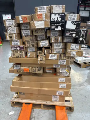 Pallet of assorted faux wood… — Photo 1