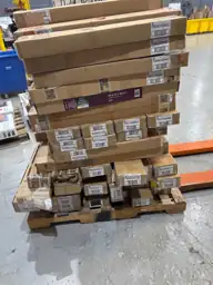Pallet of assorted faux wood… — Photo 4