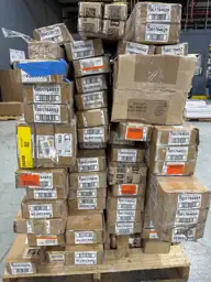 Pallet of assorted faux wood… — Photo 1