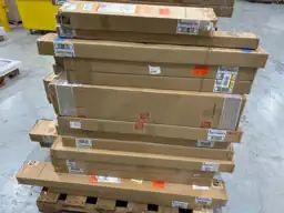 Pallet of assorted faux wood… — Photo 2