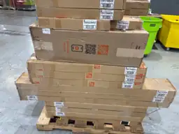 Pallet of assorted faux wood… — Photo 4