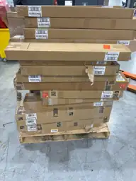 Pallet of assorted faux wood… — Photo 1