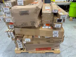 Pallet of assorted faux wood… — Photo 4