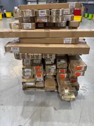Pallet of assorted faux wood… — Photo 1