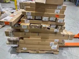 Pallet of assorted faux wood… — Photo 2
