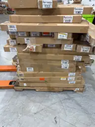 Pallet of assorted faux wood… — Photo 4