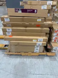 Pallet of assorted faux wood… — Photo 2