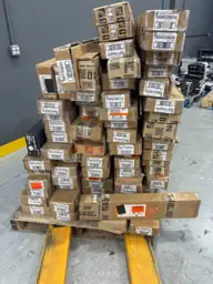 Pallet of assorted faux wood… — Photo 1