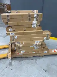Pallet of assorted faux wood… — Photo 2