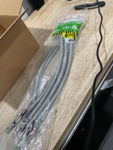 Faucet supply lines — Photo 1